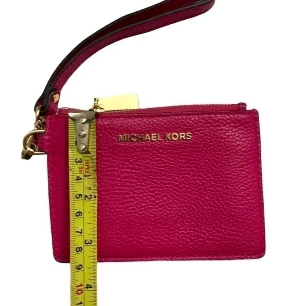 Michael Kors pink pebbled leather wristlet keyring bag